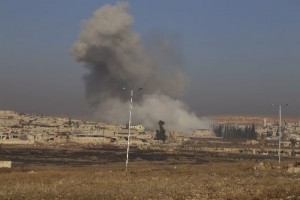 Smoke rises after what activists said was an air strike by forces loyal to Syria's President Assad beside the Kindi Hospital frontline in Aleppo