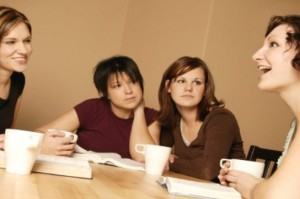young-women-talking-at-table1