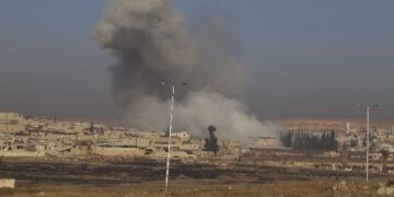 Smoke rises after what activists said was an air strike by forces loyal to Syria's President Bashar al-Assad beside the Kindi Hospital frontline in Aleppo, December 21, 2013. REUTERS/Ahmad Othman (SYRIA - Tags: CIVIL UNREST CONFLICT)