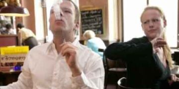 GERMANY - AUGUST 03: Symbolic picture to the topics: passive smoking, smoking, addiction, Our picture shows a smoker smoked a cigarette at a cafe - shirty guests. (Photo by Ulrich Baumgarten via Getty Images)