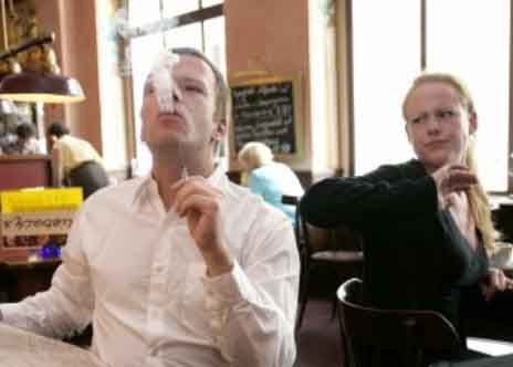 GERMANY - AUGUST 03: Symbolic picture to the topics: passive smoking, smoking, addiction, Our picture shows a smoker smoked a cigarette at a cafe - shirty guests. (Photo by Ulrich Baumgarten via Getty Images)